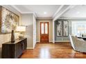 Bright entryway with hardwood floors and modern decor at 3335 Knob Hill Ct, Charlotte, NC 28210