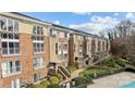 Complex of townhouses with pool and city skyline view at 3957 Picasso Ct, Charlotte, NC 28205