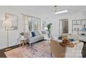 Living room with ample natural light, comfy seating, and stylish decor at 401 Stokes Ave, Clover, SC 29710