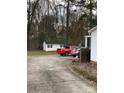 Detached garage with a long driveway at 9608 Sunway Dr, Mint Hill, NC 28227