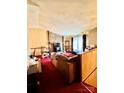Spacious living room features a stone fireplace and ample seating at 6219 Long Pine Dr # 32, Charlotte, NC 28227