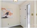 Bright entryway with a large piece of art at 4017 Sulkirk Rd, Charlotte, NC 28210