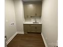 Mud room features ample cabinetry, counter space, undermount sink, and convenient washer/dryer hookups at 4033 Stadler Ne Dr # 22, Conover, NC 28613