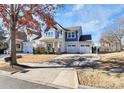 Two-story house with blue siding and two-car garage at 19935 Wooden Tee Dr, Davidson, NC 28036