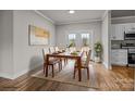 Bright dining area with a wooden table and four chairs at 4759 Mel Nunnery Rd, Fort Lawn, SC 29714