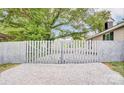 Private backyard with gray fence and gravel driveway at 612 Calvary St, Shelby, NC 28150