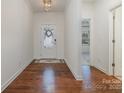 Bright entryway with hardwood floors and access to other rooms at 14509 Batteliere Dr, Charlotte, NC 28278