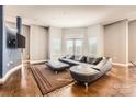 Spacious living room with dark hardwood floors at 525 E 6Th St # 409, Charlotte, NC 28202