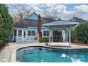 Inviting backyard oasis featuring a swimming pool and gazebo at 6415 Outer Bridge Ln, Charlotte, NC 28270