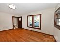 Bright living room featuring hardwood floors and large windows at 1909 2Nd Sw Ave, Hickory, NC 28602