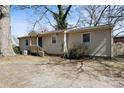 Beige ranch style house with small porch, stone pathway and blue front door at 503 N Boyce St, Gastonia, NC 28052