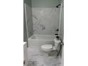 Modern bathroom with marble shower and bathtub at 815 Jefferson St, Shelby, NC 28150