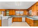 Classic kitchen with wood cabinets and built in oven at 223 W 9Th St, Newton, NC 28658