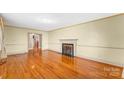 Hardwood floors and fireplace in spacious living room at 223 W 9Th St, Newton, NC 28658