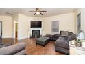 Spacious living room with fireplace and hardwood floors at 2548 Flintshire Ln, Gastonia, NC 28056