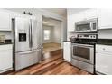 Modern kitchen featuring stainless steel appliances and ample cabinetry at 1485 Adkin Dr, Iron Station, NC 28080