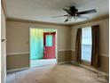 Bright living room with a view of the back door and plenty of natural light at 155 Stanwyck Rd, Salisbury, NC 28147