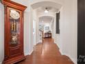 Bright entryway with hardwood floors and views to living area at 10439 Donahue Dr, Huntersville, NC 28078