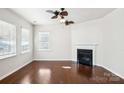 Spacious living room with hardwood floors and fireplace at 145 Chertsey Dr, Mooresville, NC 28115