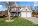 Two-story house with a two-car garage and large front yard at 4115 Stuart Ln, Indian Land, SC 29707