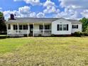 White house with a front porch and yard at 6050 Mcconnells Hwy, McConnells, SC 29726