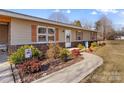Charming ranch home with walkway and landscaping at 111 Lois Ct, Statesville, NC 28625