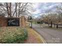 Gated entrance to The Yacht Club on Lake Wylie community at 13913 Queens Harbor Rd, Charlotte, NC 28278