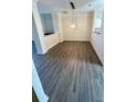 Bright dining room with hardwood floors and modern light fixture at 14243 Richmond Park Ave, Charlotte, NC 28277