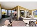 Outdoor patio with seating area and glass doors leading inside at 1132 Cades Ct, Denver, NC 28037