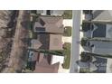 Drone shot of neighborhood highlighting roofs, landscaping, and street layout at 4774 Looking Glass Trl, Denver, NC 28037