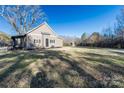 House exterior showcasing a side view and yard at 247 Camp Rotary Rd, Gastonia, NC 28052