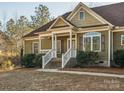 House exterior with front porch and landscaping at 1744 White Fawn Ln, Rock Hill, SC 29730