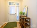 Bright entryway with wood shelving and a full-length mirror at 810 Ayrshire Ave, Fort Mill, SC 29708