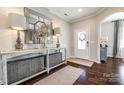 Bright entryway with a console table, mirror, and ample natural light at 1968 Sapphire Meadow Dr, Fort Mill, SC 29715