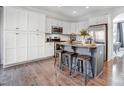 Spacious kitchen with white cabinets, granite island, and stainless steel appliances at 356 Nantucket Way, Rock Hill, SC 29732