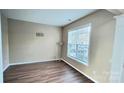 Bright office with hardwood floors and large window at 14021 Eldon Dr, Charlotte, NC 28277