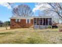 Brick ranch house with screened porch and deck at 3524 Lancaster Hwy, Monroe, NC 28112