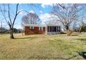 Brick ranch house with screened porch and yard at 3524 Lancaster Hwy, Monroe, NC 28112