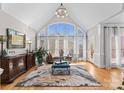 Spacious living room with vaulted ceiling and large windows at 1740 Withers Dr, Denver, NC 28037