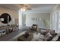 Spacious living room with wood-look floors and stylish furniture at 2379 Justin Dr, York, SC 29745