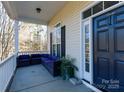 Inviting front porch with seating area, perfect for relaxing at 419 Kinsey Creek Ct, Rock Hill, SC 29730