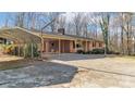 Ranch house with carport and basketball hoop at 1056 Jolly Cemetery Rd, Taylorsville, NC 28681