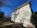 Side view of house with vinyl siding at 2306 Cota Ct, Charlotte, NC 28262