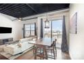 Spacious living room with city views and modern furniture at 2338 Yadkin Ave # 505, Charlotte, NC 28205