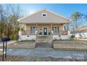 Charming house with a front porch and well-maintained landscaping at 138 Pinckney St, Chester, SC 29706