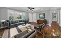Bright living room with hardwood floors, and neutral color palette at 206 Hunter St, York, SC 29745