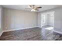 Spacious living room with hardwood floors and neutral-colored walls at 277 Stewart Nw St, Concord, NC 28027