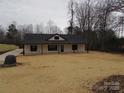 Newly constructed home with a charming front porch and landscaped yard at 3720 Turner Rd, Clover, SC 29710