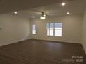 Spacious living room with hardwood floors and ceiling fan at 3720 Turner Rd, Clover, SC 29710