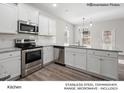 Kitchen with white cabinets, granite countertops, and stainless steel appliances at 13119 Hamilton Rd, Charlotte, NC 28273